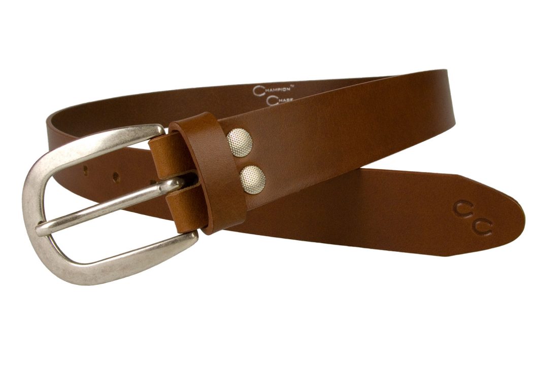 Womens Tan Belt With Old Silver Tone Buckle. Champion Chase Horse Shoe Motif to Tip of Belt. Ornate Domed Rivets To Belt Return. 3 cm Wide Leather Belt. MadeIn UK by Skilled British Craftsmen. Full Grain Italian Vegetable Tanned Leather. Leather Thickness Approximately 3mm