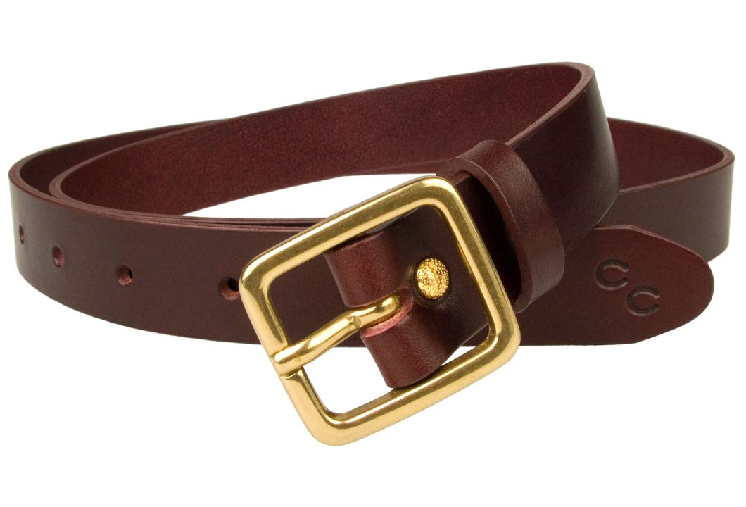 Narrow Leather Belt Mulberry Colour Leather Solid Brass Buckle. Free Sliding Loop and Ornate Gold Plated rivet closure. Champion Chase Double Horse SHoe Motif to tip of belt. British Made Leather Belt using High Quality Italian Full Grain Leather. Italian Made Solid Brass Buckle. 2.5 cm Wide Leather Belt (approx. 1 inch). Leather thickness approx 3mm.