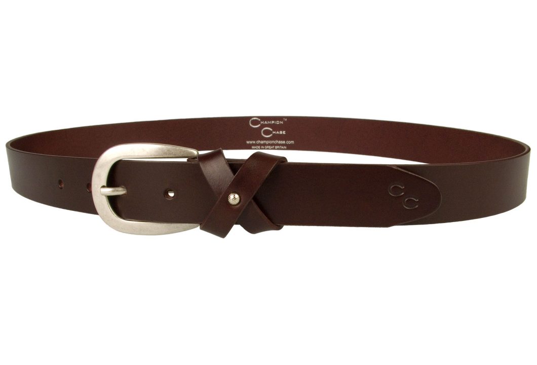 A High Quality British Made Womens Leather Belt In Rich Mulberry Tone Leather. This mulberry tone leather belt is made in the UK by British Artisans using high quality Italian Full Grain Leather. The belt comes with a  high quality Italian made silver plated buckle with an Antique finish. The keeper is made from a crisscrossed leather loop with a small domed ornament to the center giving a feminine 'bow' effect.The belt tip also comes with the Champion Chase ™ signature horse shoe motif.