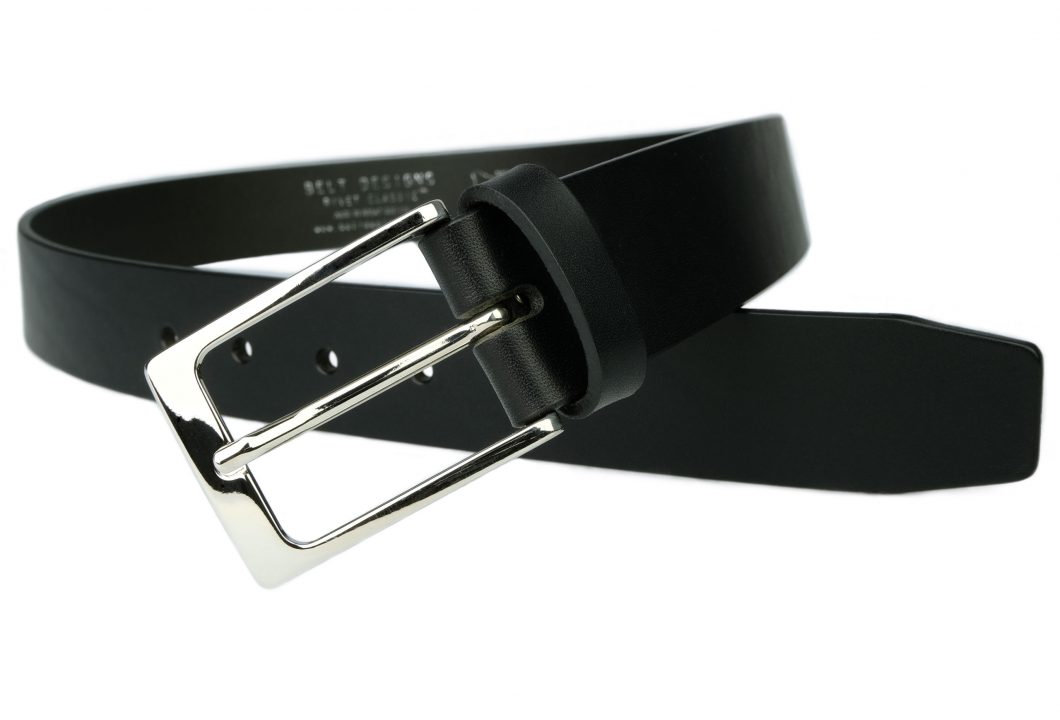 Rivet Classic Mens Black Leather Belt - UK Made. 3.5cm Wide. Made with a single piece of full grain Italian vegetable tanned leather along with bright nickel plated Italian made buckle. A smart addition to a casual suit or everyday wear. Robust and made to last.