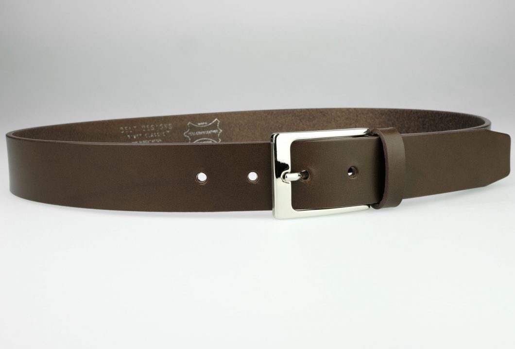 Brown Leather Belt With Bright Shiny Buckle. 3.5 cm Wide ( 1 3/8 inch). Italian Full Grain vegetable tanned leather. Italian made shiny nickel plated half buckle. Made In UK. Brand Rivet Classic.